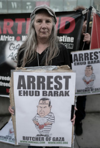 A protester in the UK during a visit by Barak in May 2018 (Creative Commons)